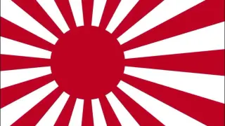 Flaga Japonii z czerwonym słońcem i promieniami.